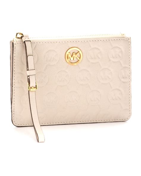 michael kors vanilla iphone wristlet|Michael Kors clutch.